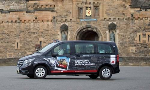 Taxi with Edinburgh Castle branding