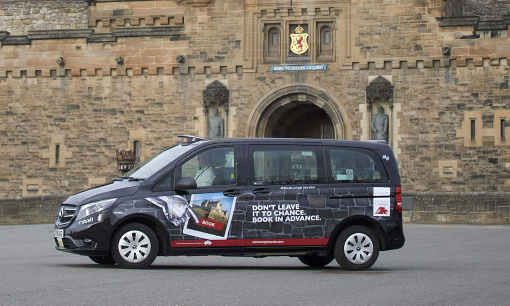 Taxi with Edinburgh Castle branding