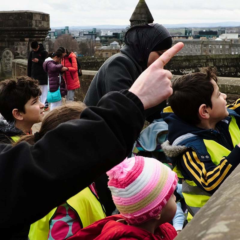 Syrian refugees having a fun day out at the castle