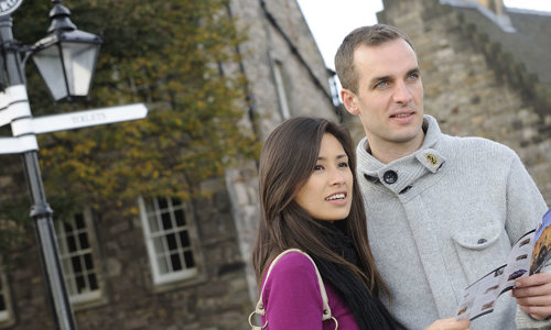 Visitors using orientation map to visit the castle