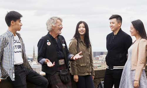 Chinese visitors with one of our guides at Edinburgh Castle
