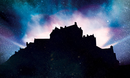 Silhouette of Edinburgh Castle with night sky and stars