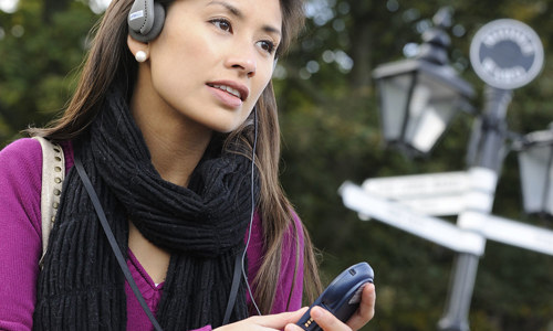 Chinese visitor enjoying the audio tour in Simplified Chinese